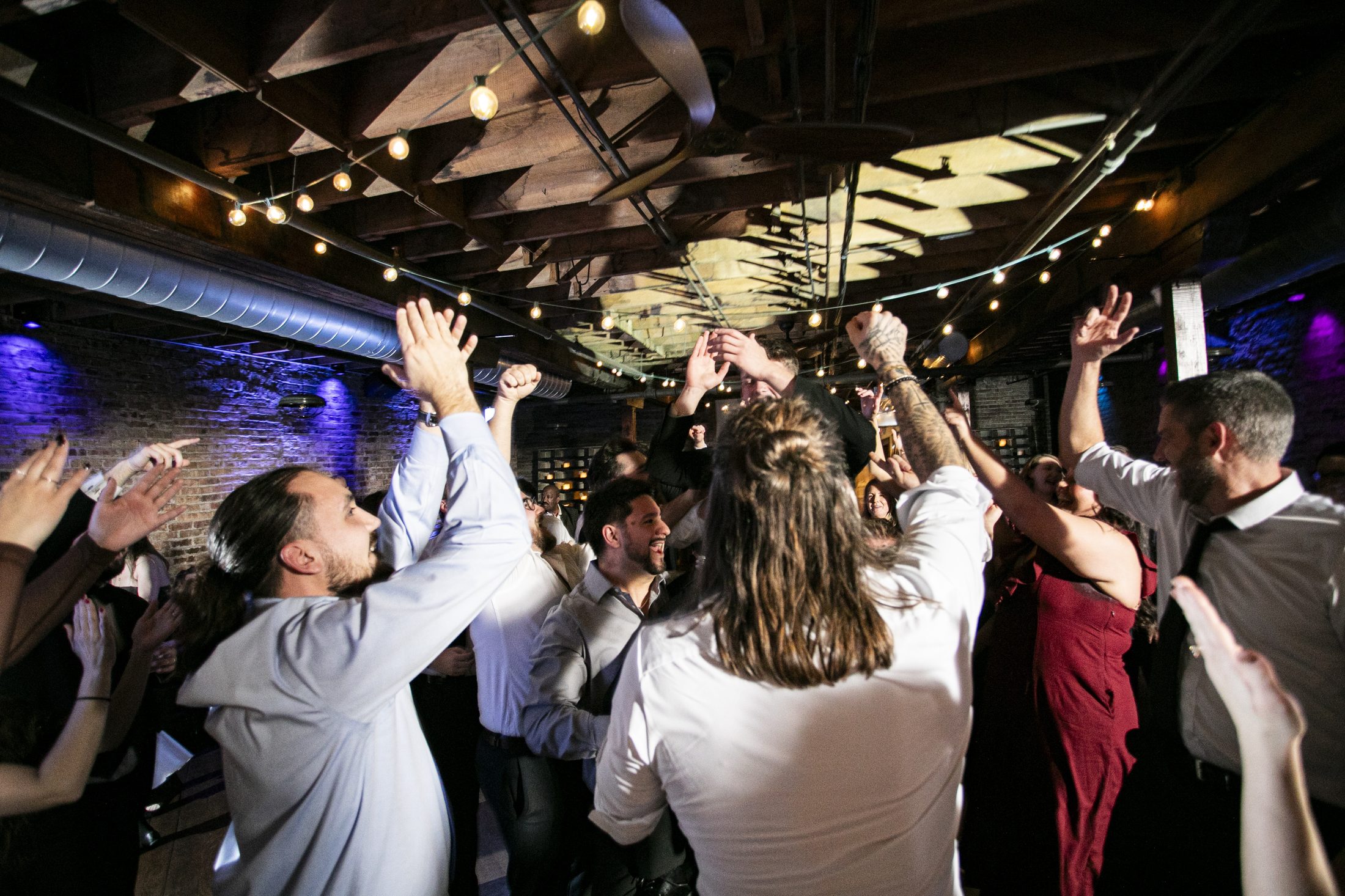 Wedding guests dancing