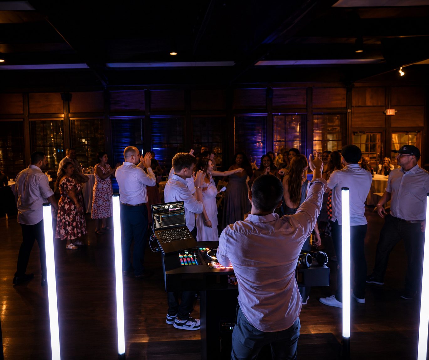 Outdoor wedding reception with light towers